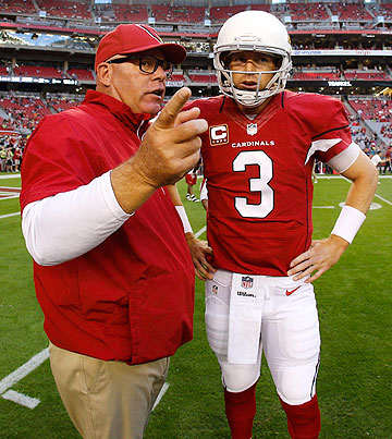 In their first season working together, it took Arians and Palmer awhile to get on the same page. (Ric Tapia/AP)